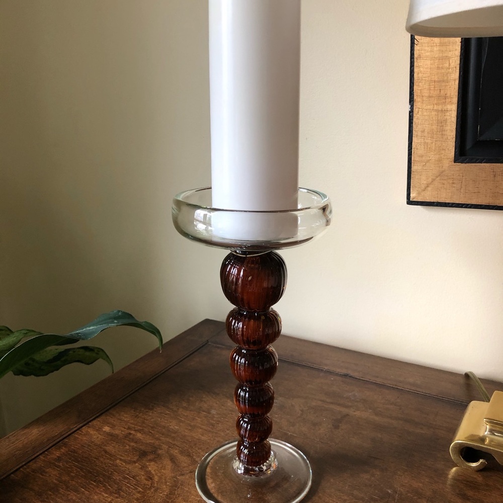 Hand blown glass candlestick.